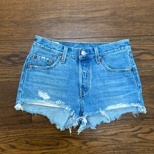 Levi’s 501 button front cut off distressed denim shorts, size 25